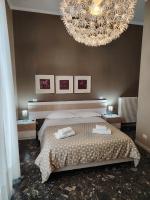 Posteľ alebo postele v izbe v ubytovaní B&B Lucana 22