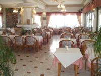 Reštaurácia alebo iné gastronomické zariadenie v ubytovaní Sagittarius Apartments