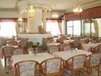 Reštaurácia alebo iné gastronomické zariadenie v ubytovaní Sagittarius Apartments