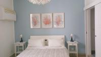 A bed or beds in a room at La Piazzetta