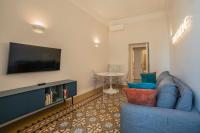 A television and/or entertainment centre at Vintage Ottaviano Apartment