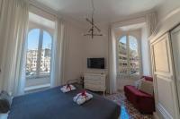 A bed or beds in a room at Vintage Ottaviano Apartment