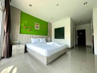 Postel nebo postele na pokoji v ubytování Anantra Pattaya Resort