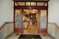 an entrance to a building with wooden doors at Hotel Marina Victoria in Algeciras