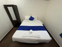 Letto o letti in una camera di COCO NET Hotel