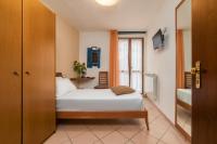 Posteľ alebo postele v izbe v ubytovaní Hotel Oasi Verde