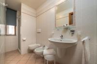 Kúpeľňa v ubytovaní Hotel Oasi Verde