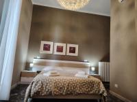 Posteľ alebo postele v izbe v ubytovaní B&B Lucana 22