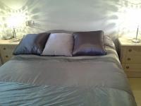 A bed or beds in a room at Apartment 241