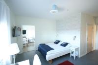 Postel nebo postele na pokoji v ubytování Nynäsgården Hotell & Konferens