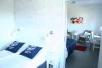 Postel nebo postele na pokoji v ubytování Nynäsgården Hotell & Konferens
