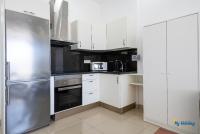 Kuchyň nebo kuchyňský kout v ubytování Lenas Modern Apartment