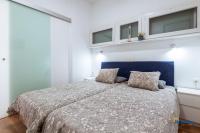Postel nebo postele na pokoji v ubytování Lenas Modern Apartment