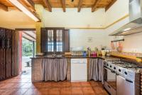 A kitchen or kitchenette at Panoramic View Villa Almogía
