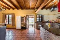A kitchen or kitchenette at Panoramic View Villa Almogía