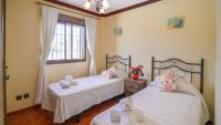 Postel nebo postele na pokoji v ubytování Las Palomas II Nerja by Ruralidays