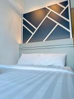 Ein Bett oder Betten in einem Zimmer der Unterkunft XING LUN KLCC The Colony Infinitum