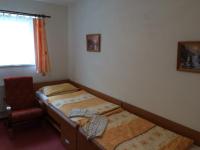 Postel nebo postele na pokoji v ubytování Penzion Rakovec