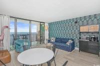 Ein Sitzbereich in der Unterkunft Coastal Comfort Your Perfect Beachfront Getaway
