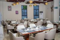 Khu vực ghế ngồi tại Wils Hotel Supreme