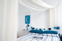 Postel nebo postele na pokoji v ubytování Aria e Luce Suites a Venezia