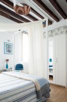 Postel nebo postele na pokoji v ubytování Aria e Luce Suites a Venezia