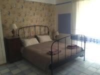 A bed or beds in a room at Casa Carmela