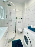 Kúpeľňa v ubytovaní Alpesi Apartman Downtown