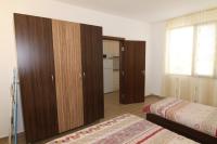 Postel nebo postele na pokoji v ubytování Apartments in Lotos Complex