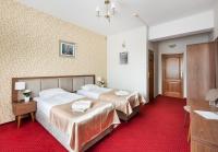 Posteľ alebo postele v izbe v ubytovaní Hotel Arkadia