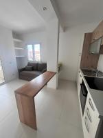 A kitchen or kitchenette at Cormorani - Appartamento 13