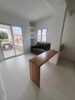 A seating area at Cormorani - Appartamento 13