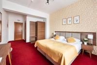 Posteľ alebo postele v izbe v ubytovaní Hotel Arkadia