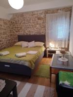 Postel nebo postele na pokoji v ubytování Country house Koštela