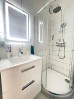 Kúpeľňa v ubytovaní Alpesi Apartman Downtown