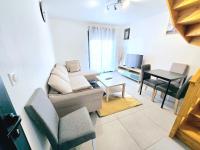 Część wypoczynkowa w obiekcie Joli appartement proche Paris Orly - Climatisé