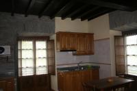 Kuchyň nebo kuchyňský kout v ubytování Apartamentos Rurales El Palacio de Doiras