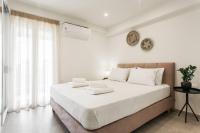 Posteľ alebo postele v izbe v ubytovaní 2bdr Athens Riviera Sea View Apartment By The Olon
