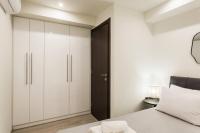 Posteľ alebo postele v izbe v ubytovaní 2bdr Athens Riviera Sea View Apartment By The Olon