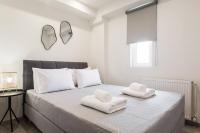 Posteľ alebo postele v izbe v ubytovaní 2bdr Athens Riviera Sea View Apartment By The Olon