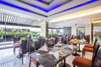 Un restaurante u otro lugar para comer en Nouvo City Hotel