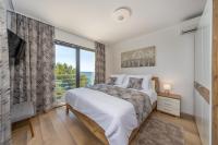 Posteľ alebo postele v izbe v ubytovaní Villa Poseidon