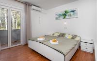 Posteľ alebo postele v izbe v ubytovaní 2 Bedroom Nice Apartment In Lopar