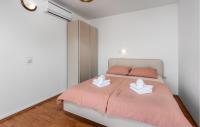 Posteľ alebo postele v izbe v ubytovaní 2 Bedroom Nice Apartment In Lopar