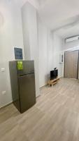Televízia a/alebo spoločenská miestnosť v ubytovaní SKG Loft