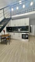 Kuchyňa alebo kuchynka v ubytovaní SKG Loft