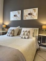 A bed or beds in a room at Your Studio Apartment in Sirmione