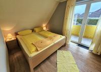 Postel nebo postele na pokoji v ubytování Revenstorf Wohnung 2