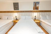 Postel nebo postele na pokoji v ubytování Superior Pyramids Inn
