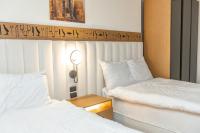 Postel nebo postele na pokoji v ubytování Superior Pyramids Inn